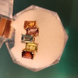 Multi stone ring. 5 emerald cut semi precious stones in yellow gold size 7 1/2